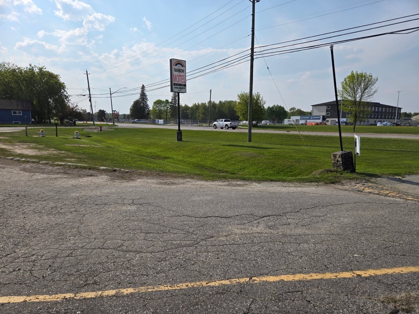 Commercial property lawn neatly cut after service